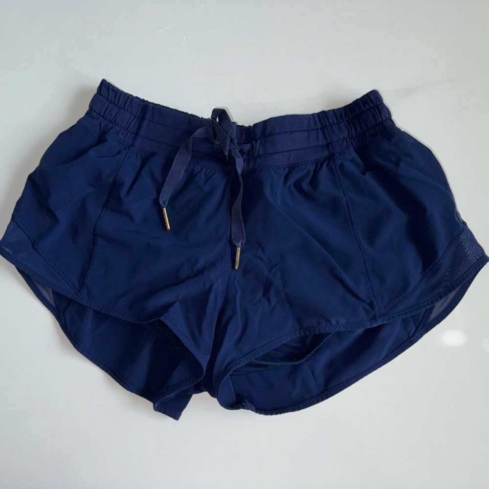 Lululemon Navy Blue Hotty Hot low rise 2.5” shorts
Size 4